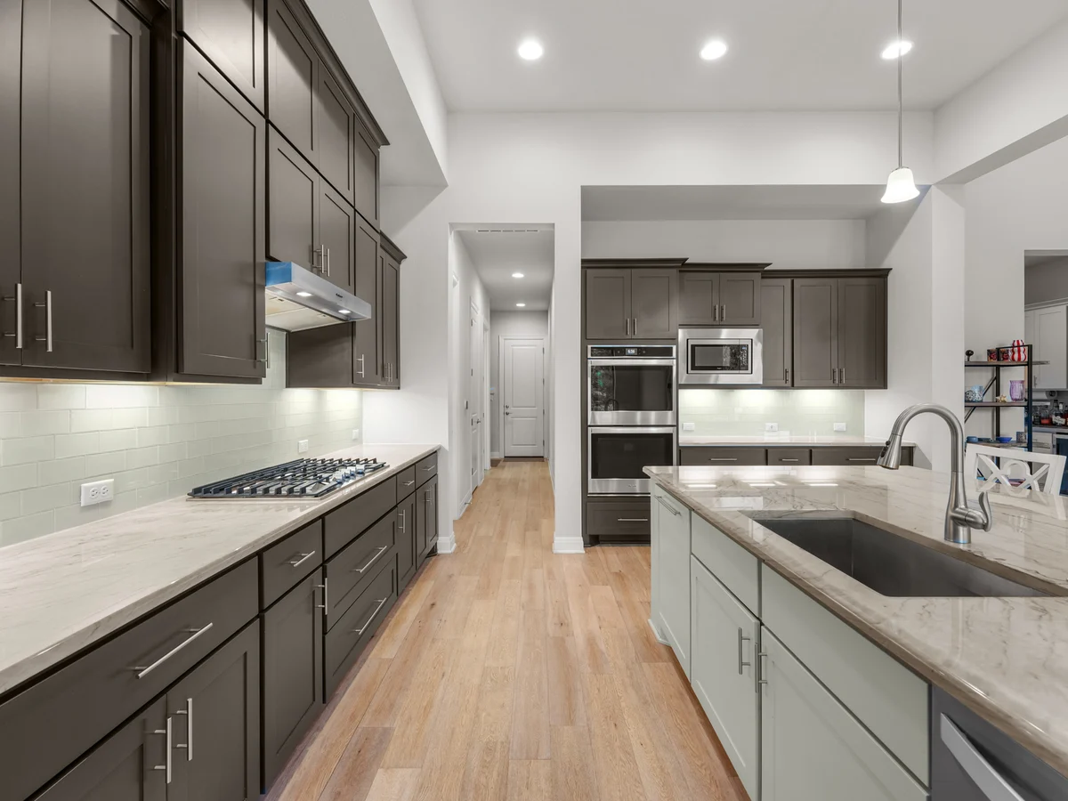 Kitchen at 649 Bunker Ranch Blvd with dark cabinetry, gas cooktop and a large island
